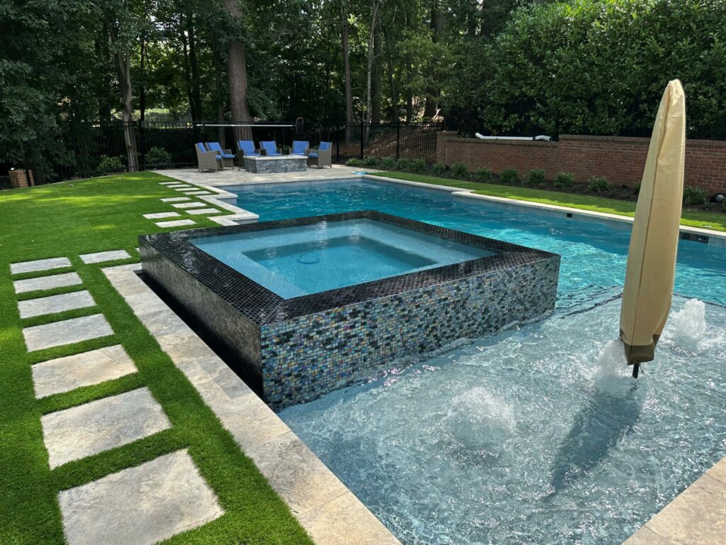 A Luxurious Pool With a Natural Stone Wall