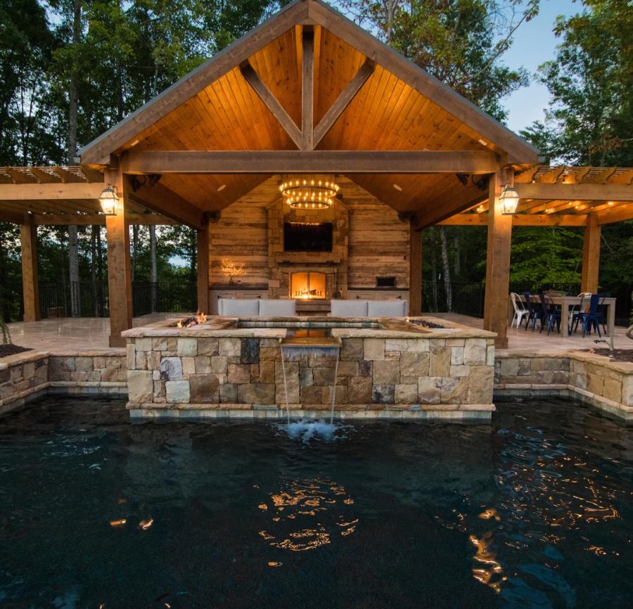 Pool With A Waterfall And A Gazebo