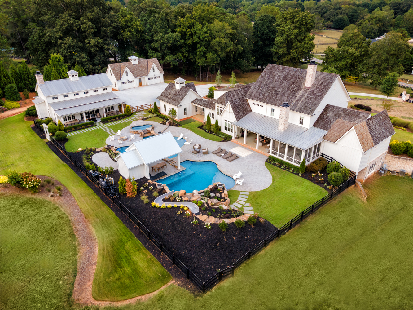 Aerial view of Chipper Jones’ expansive backyard featuring two custom-designed swimming pools built by Georgia Classic Pool.