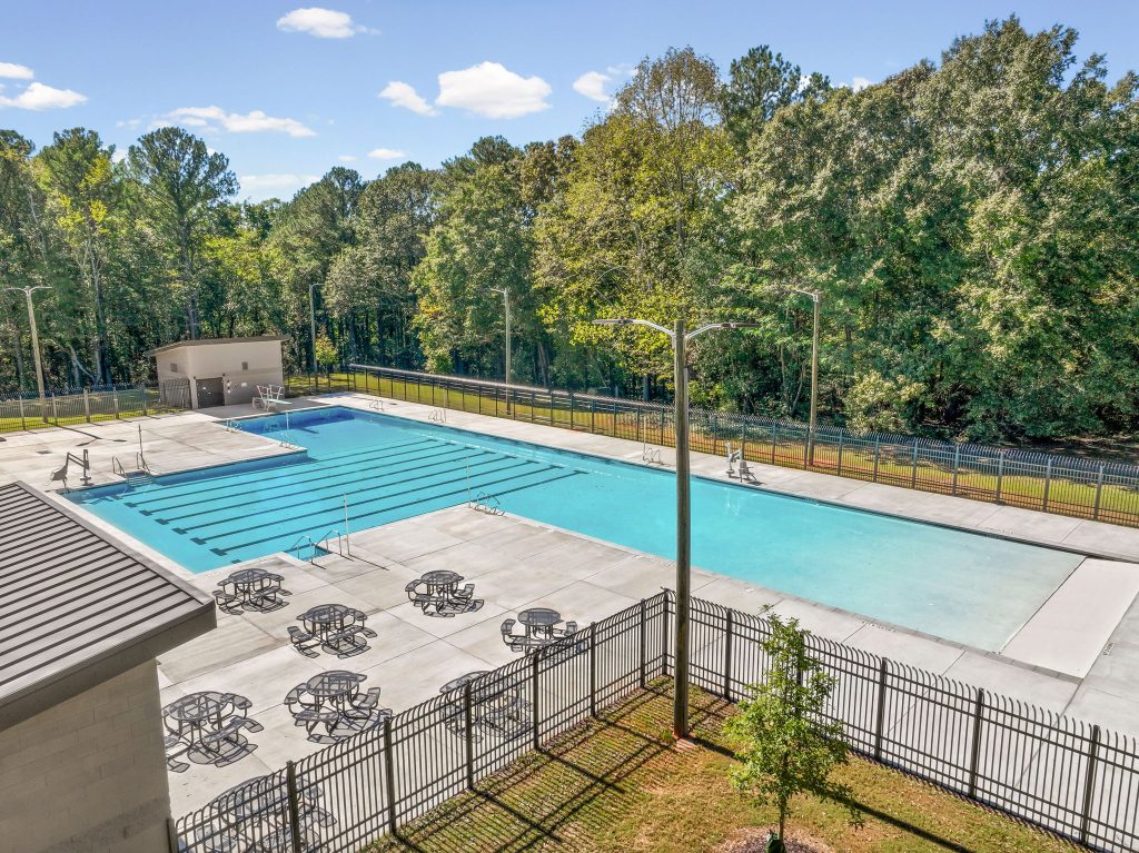 NH Scott Park commercial pool with lap lanes, diving area and surrounding pool deck